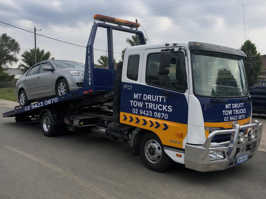 Tow truck loading a car in Mt Druitt